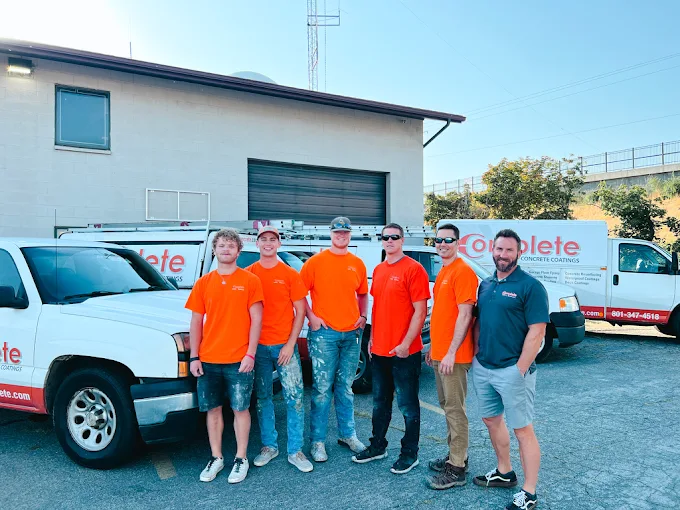 The Complete Concrete Coatings crew in front of the company trucks in Centerville, UT