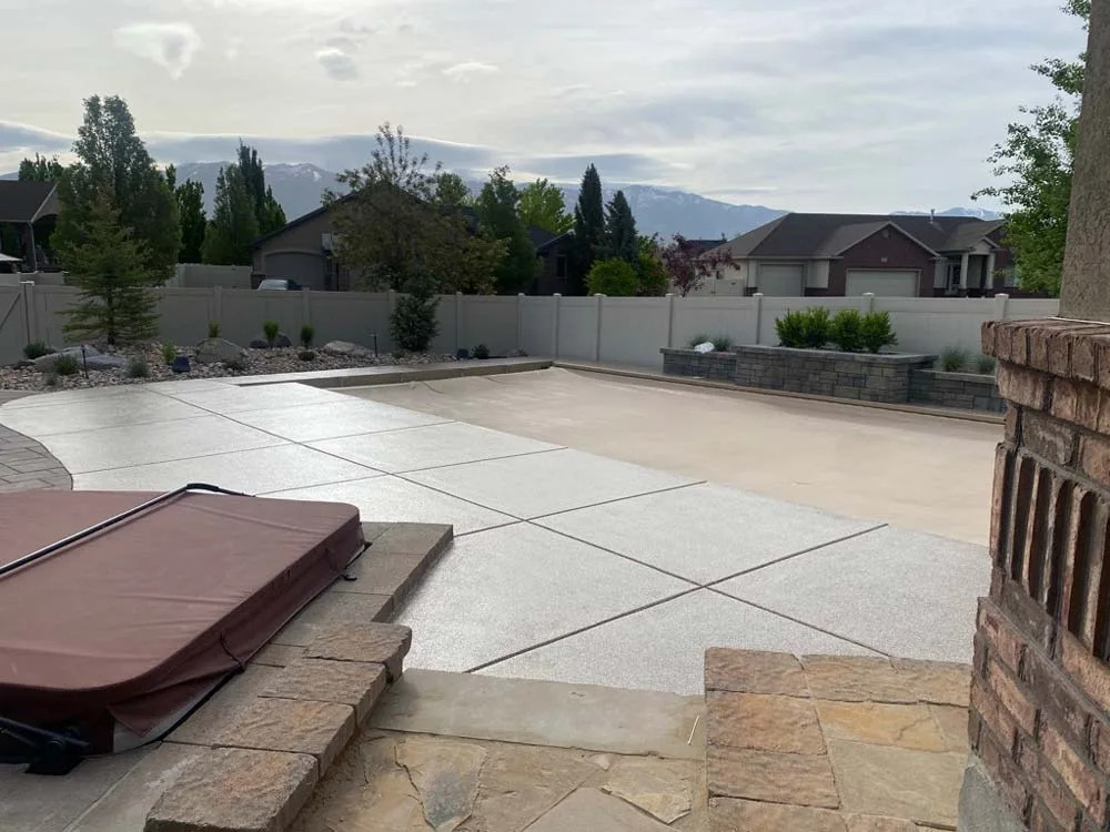 Coated hot tub surround and patio